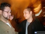 Two Men in Urban Nighttime Setting