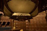 Elegant Lighting Fixture in a Crypt-like Room