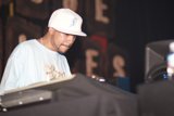DJ Craze in White Shirt and Baseball Cap