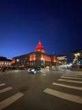 Red Building and Clock Tower in Metropolis