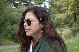 Woman in Green Cardigan Enjoying Nature