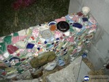 Artistic Mosaic Wall of Tiles and Collectibles