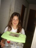 Girl with a Box at the Door