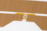 Plywood Floor with Yellow Paper