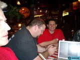 Red Shirted Man at the Bar