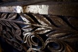 Handcrafted Wooden Handrail with Bronze Emblem