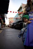 Innocent Slumber Amid the Urban Hustle