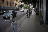 Parked Bike on Busy Sidewalk