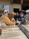 Two Women, a Dog, and Sunglasses