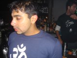 Two Men Drinking at a Bar Counter