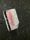 Abandoned Ticket on the Road