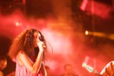 Solange Portrait Singing Bassist Background Red Orange