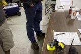 Blue Jeans on Plywood Floor