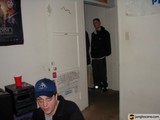 Alan W Sports His Black Jacket and Baseball Cap