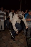 Man in a Stylish Hat Shows Off his Break Dancing Skills