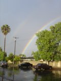 Double Rainbow Over Busy Parking Lot