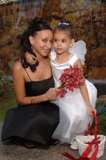 Two Bridesmaids with Beautiful Flower Arrangements