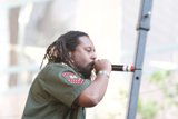 Dreadlocked Entertainer with Mic