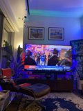 Cozy Living Room with a High-Tech Entertainment Center
