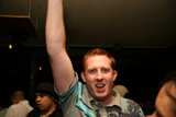 Blue Shirted Man in the Night Club