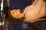 Joyful Woman Laughing in Warm Evening Light