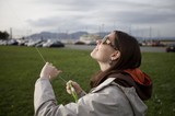 Woman Flying Kite at San Francisco Bay Park