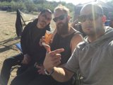 Three Friends Enjoying a Cold Beer Outdoors