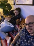 A Cozy Afternoon with Dave, Lori, and Their Furry Friend