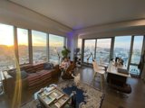 Sunset Views from a Chic Penthouse Living Room