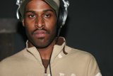 Brown Jacket and Headphones