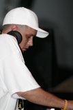 Hat-wearing Man in White Shirt