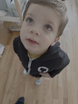 Young Child Looking Up with Wonder