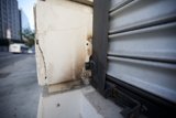 Rusty Metal Door with Broken Window