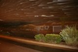 Nighttime blur with house in the background