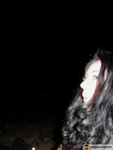 Nighttime Portrait of a Woman with Long Black Hair