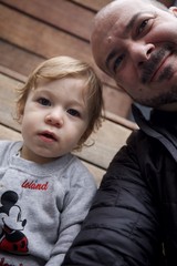 Father and Toddler Selfie on Wooden Deck