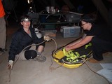Night Crew Prepares Rescue Equipment Before Event