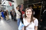 Smiling Voter Waits in Line on Election Day 2008