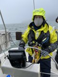 Yellow Jacketed Worker on Boat