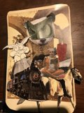Collage of Train and Cat Images on Book
