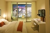 Cozy Technology in a Modern Bedroom