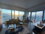 A Penthouse Living Room with a Stunning View of San Francisco