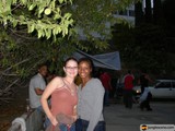 Urban Portrait of Two Women Standing in Front of a Tree