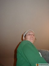 Green Shirt and White Hat