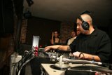 Black Shirt Deejay Mixing It Up