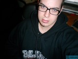 Dave B in Black Hoodie and Glasses