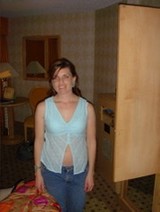 Woman Posing Casually in Hotel Room Interior