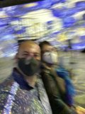 Masked Pair Against Blue and White