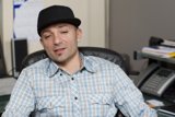 Fedora man at his desk