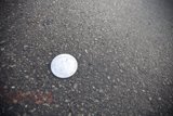 Lost Coin on Tarmac